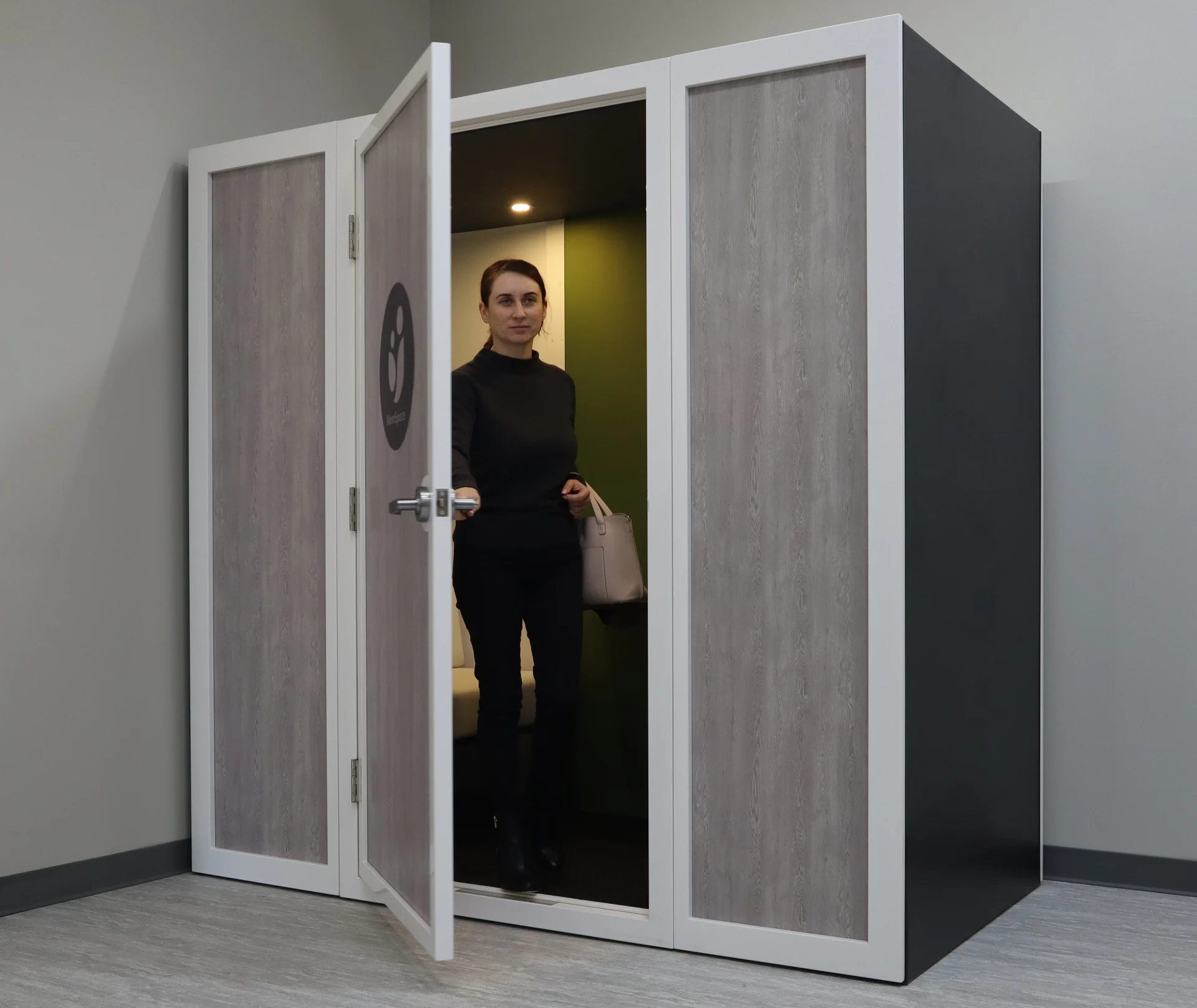 Woman Exiting MomSpace Lactation Pod